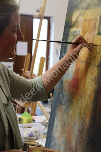 Artist Aideen Monaghan painting in Studio